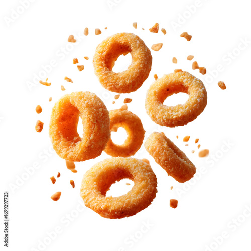 pieces of fried calamari rings mid-air with crispy coating flakes