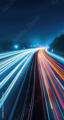 Night highway scene with vibrant light trails of speeding vehicles, creating a dynamic and colorful composition against a dark blue night sky