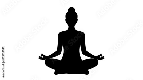 A silhouette of a person meditating in lotus position.