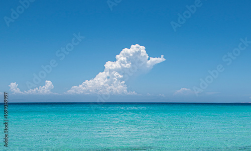 The Sea of ​​Cortez or Gulf of California on the beaches of La Paz, Baja California Sur, Mexico, on a sunny summer vacation day. sesacapes with clouds and blue sky, turquoise blue se