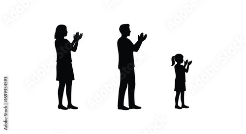 silhouettes of people clapping hands together in unity