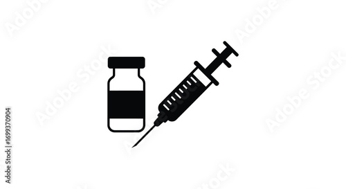 medical vial next to syringe for injection purposes