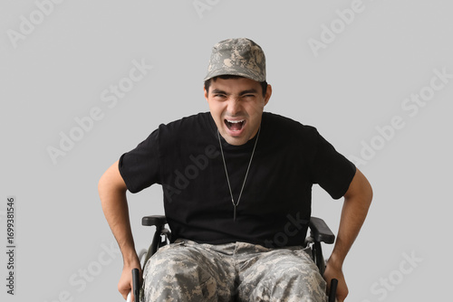 Young soldier in wheelchair...