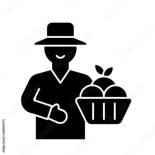 Farmer holding a basket of fresh fruit, agriculture and harvesting black glyph vector icon