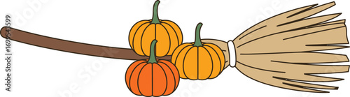 Orange pumpkins on a brown broomstick halloween
