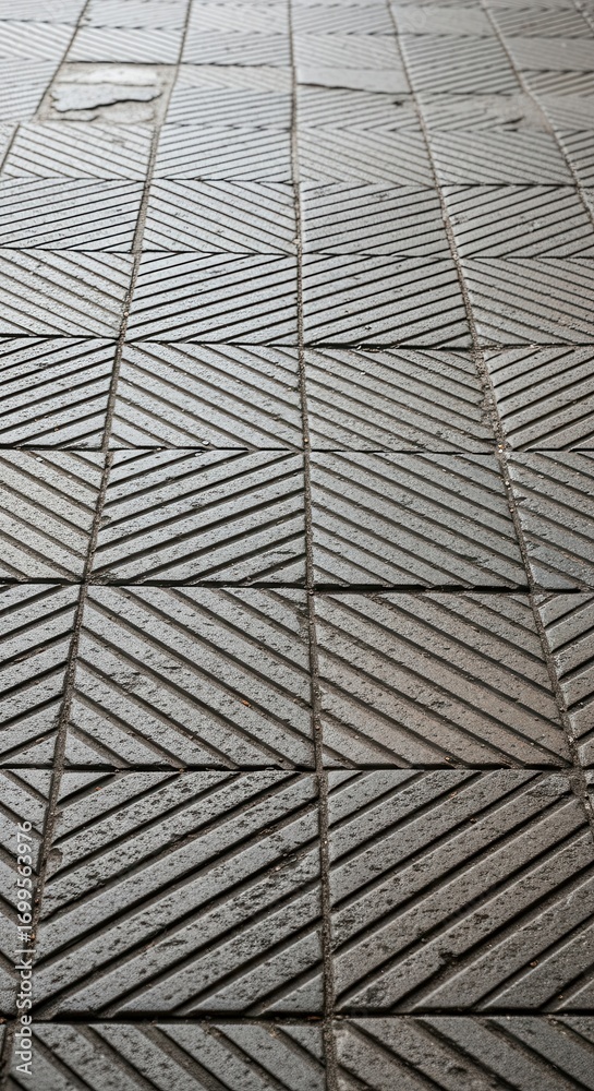 Obraz premium Abstract geometric tile pattern with diagonal line details in stone texture