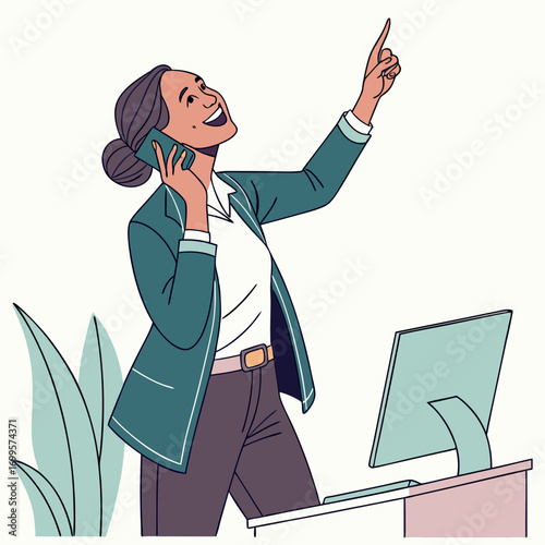Excited businesswoman on the phone pointing upwards with a smile at her desk with a computer and plants