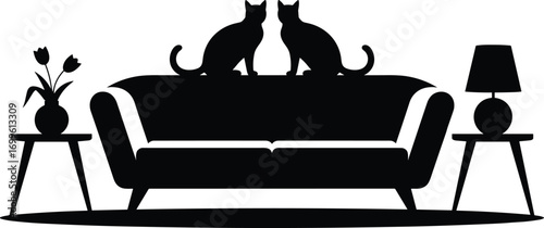 Silhouette of two cats sitting on sofa, cozy living room scene with lamp and flower vase, black and white interior design