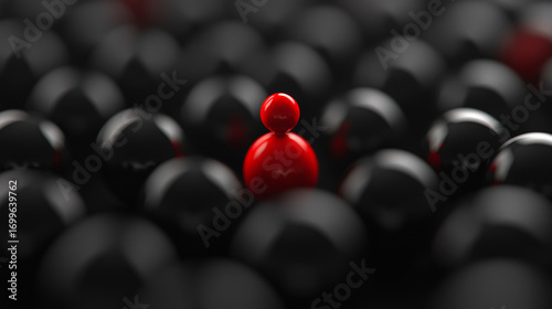 A single red figure stands out among many black figures