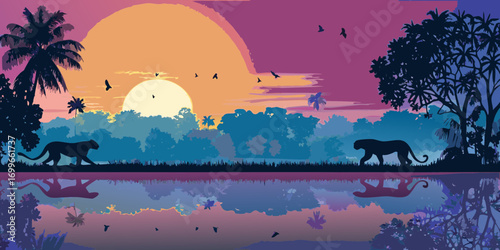 Silhouette of two panthers walking by a lake at sunset with vibrant colors