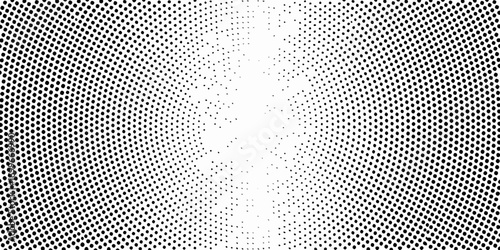 Abstract radial halftone pattern with black dots on a white background fading towards the center