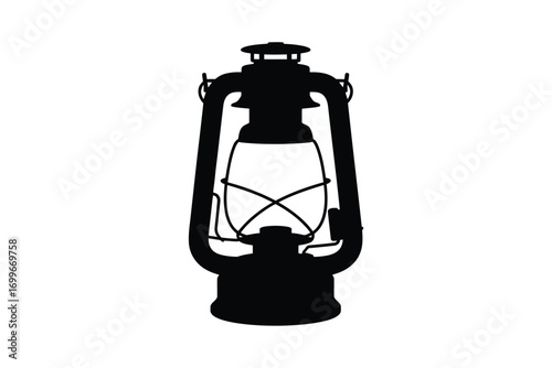 Silhouette of an old fashioned kerosene lantern