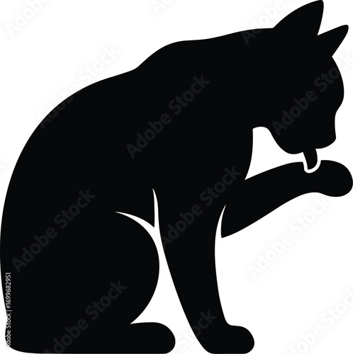 silhouette, grooming cat licking paw, seated