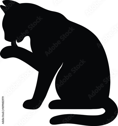 silhouette, grooming cat licking paw, seated