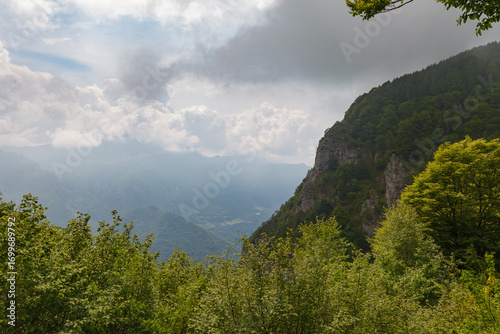Mountains view in Parco Valention on cloudy day. 23821 Piano dei Resinelli, Province of Lecco, Italy