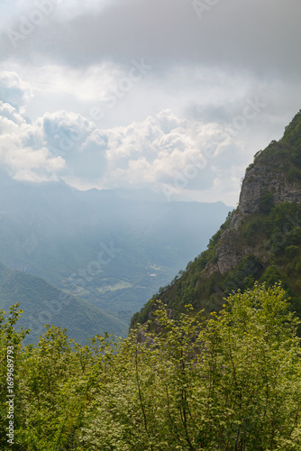 Mountains view in Parco Valention on cloudy day. 23821 Piano dei Resinelli, Province of Lecco, Italy