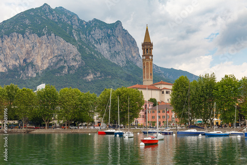 Lecco, Italy - May 21, 2024: Waterfront and marina of Lecco town, located in Lombardy, Italy