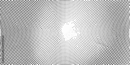 Concentric black dots forming a radial pattern on a white background with a central white space