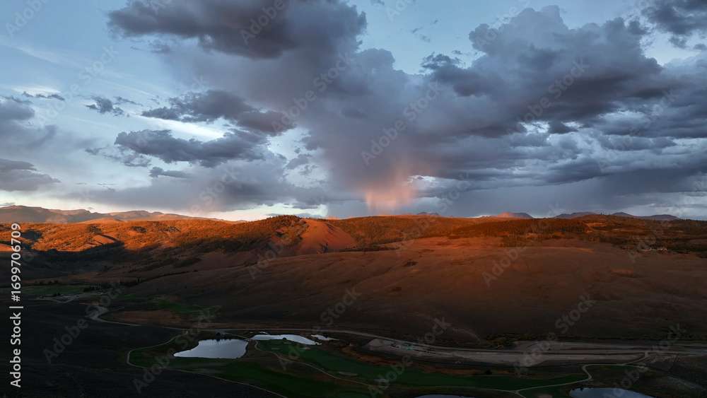 Fototapeta premium Beautiful drone sunset storm view over mountains at in Colorado fall