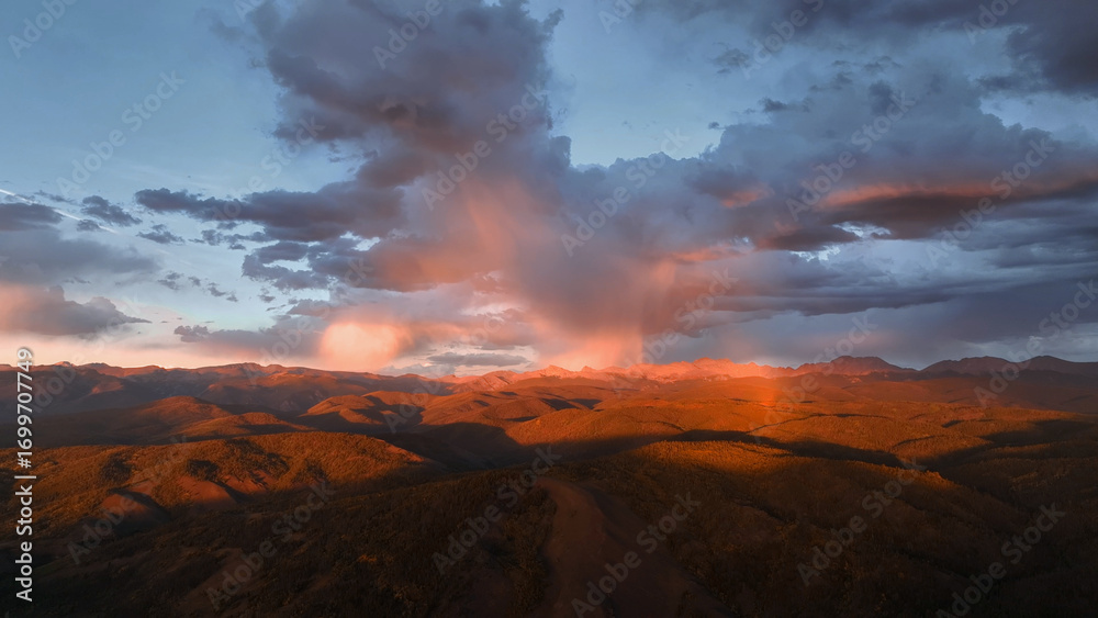 Fototapeta premium Beautiful drone sunset storm view over mountains at in Colorado fall