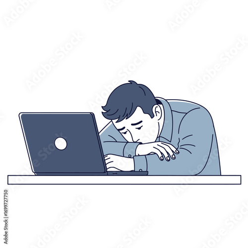 Tired businessman sleeping on his desk in front of laptop