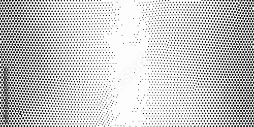 Abstract black and white halftone pattern with fading dots and diamond shapes