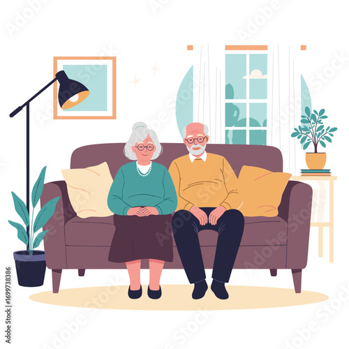 Elderly couple sitting together on sofa enjoying their time indoors with plants and art
