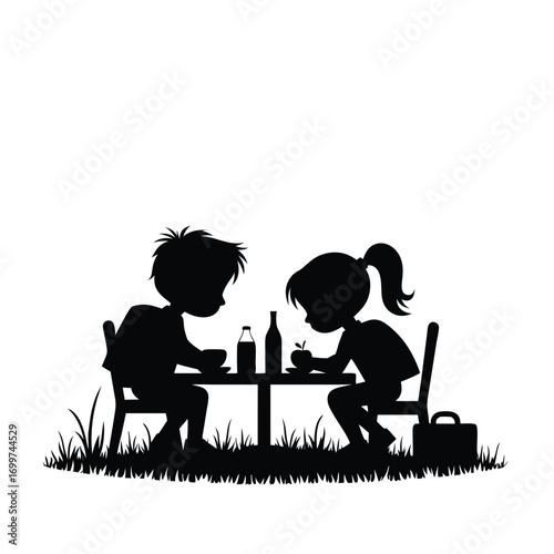 Two children eating at picnic table silhouette with backpacks