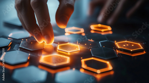 Fingers touch glowing hexagonal interface futuristic technology