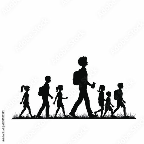 Adult leading children on a grassy path silhouette