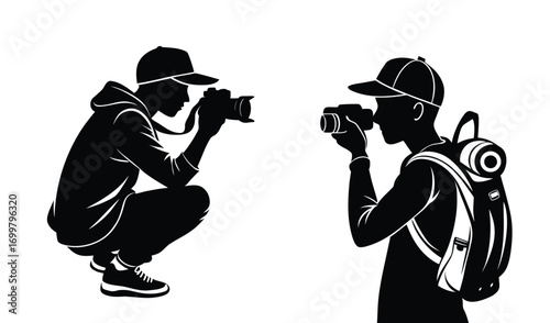 Two silhouetted photographers capturing images with cameras