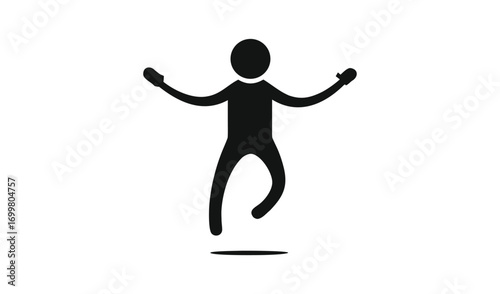 Silhouette of a happy person jumping with arms outstretched in celebration