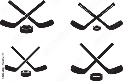 Four hockey sticks and pucks silhouette