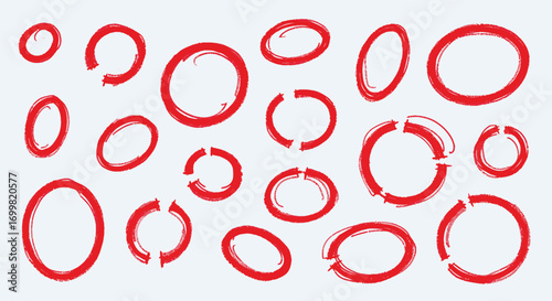 A collection of hand-drawn red circles and ovals, some complete and some with gaps, scattered across a light blue background.