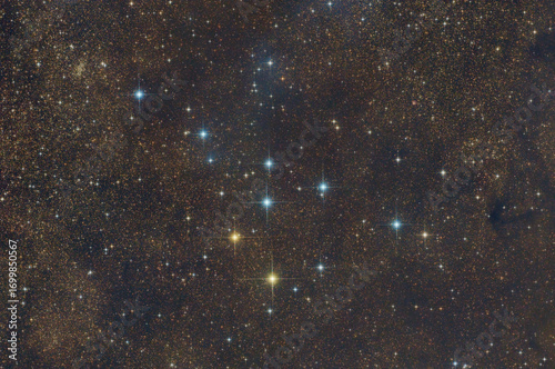 Collinder 399 Coathanger star cluster in night sky with brilliant stars