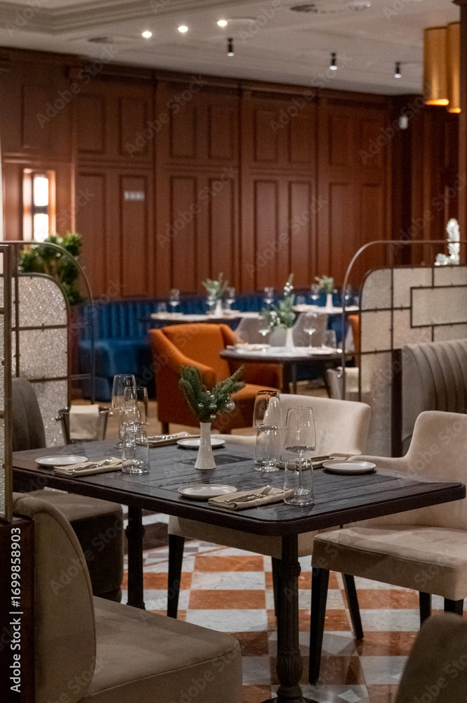 Fototapeta premium Elegant Restaurant Interior with Tables and Chairs.
