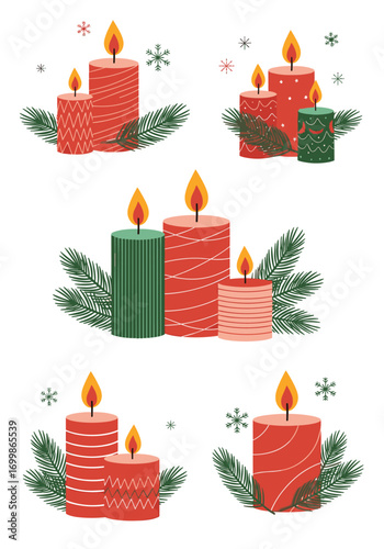 Festive christmas candles with pine needles and snowflakes for holiday decor