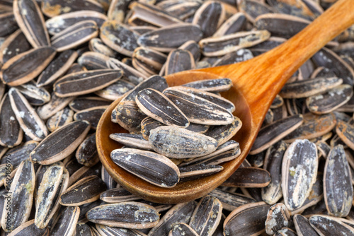 Salted sunflower seeds on a...