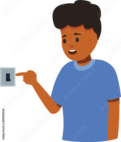 Young boy pointing at a light switch, learning about electricity, safety, and how things work