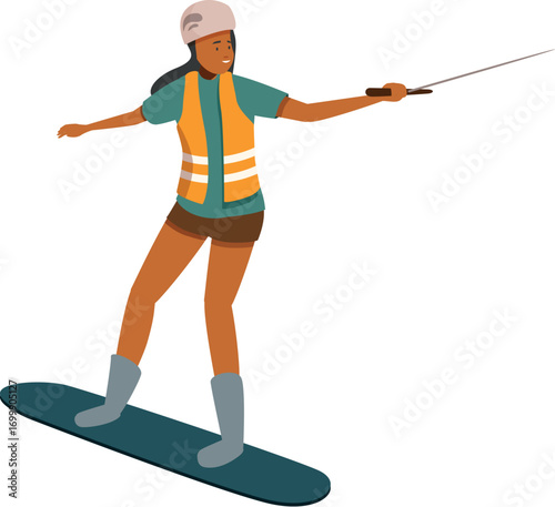 Young woman wearing helmet and life vest wakeboarding, enjoying extreme water sport