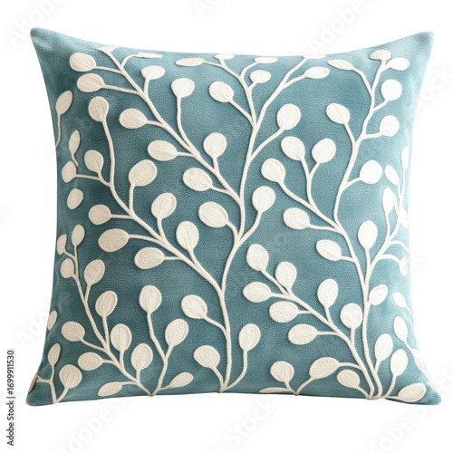 Embroidered floral pillow on turquoise blue background, cozy home decor