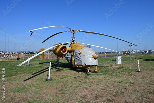 Wallpaper Mural Soviet light utility helicopter with co-axial rotors protected by a weather cover.  Torontodigital.ca
