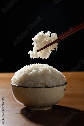 White Rice Bowl with Chopsticks Studio Photography on Black Background