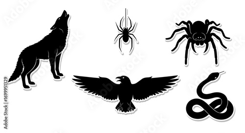 Powerful animal silhouettes featuring a wolf, spiders, snake and bird in elegant black and white design