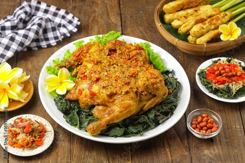 Ayam Betutu is a Balinese specialty. It's made from whole chicken or duck cooked with Balinese spices.