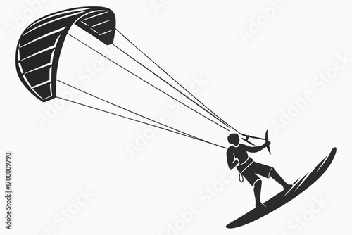 Silhouette of a Person Kiteboarding on a Surfboard.