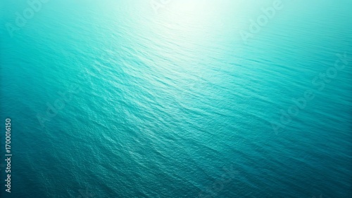 Serene Teal Ocean Surface: Aerial View, Calm Water Texture, Peaceful Summer Seascape Background