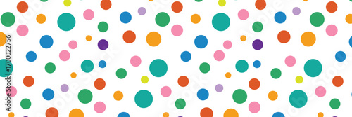 Seamless multicolor polka dot vector pattern, playful pastel fabric and paper background.