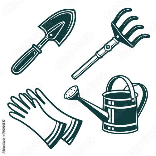 An isolated set of black plastic gardening tools including a fork, rake, and spatula on a white background