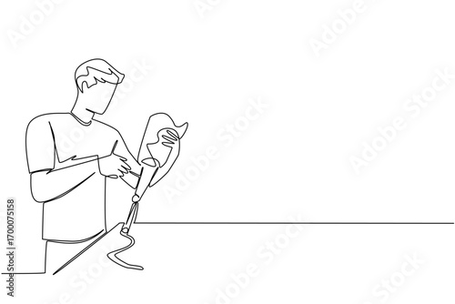 A single line draw of a young man inspecting a prosthetic leg represents health concept and human-centered design for World Day for Assistive Technology, emphasizing innovation in rehabilitation care